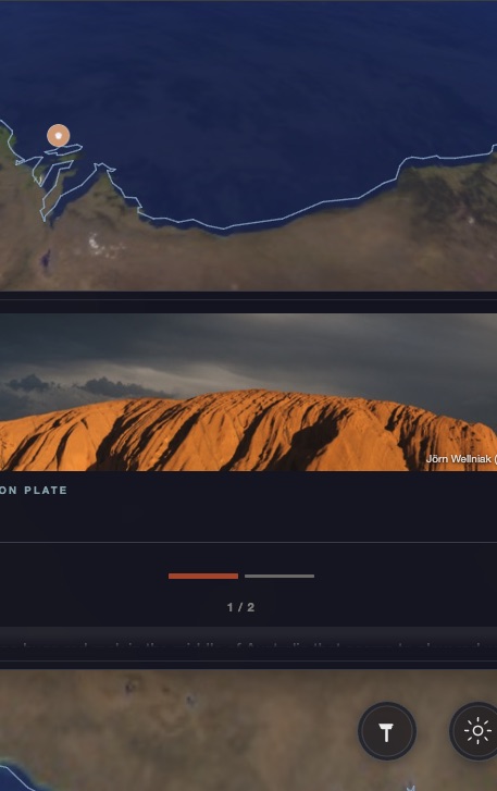 An observation plate in the app for Uluru — the rock glowing orange at sunset, over a satellite map of Australia.